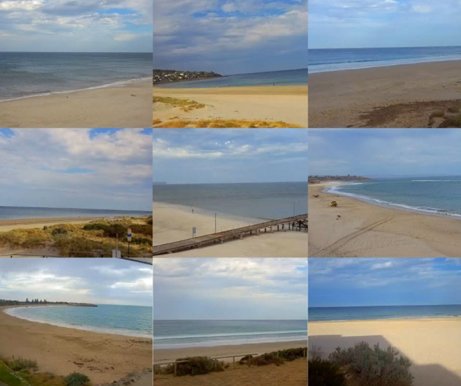 The image is a collage of nine live camera views showing coastal conditions at a beach. The photographs capture different angles of a sandy shoreline, calm to moderate ocean conditions, and a partly cloudy sky. Several views show wide stretches of beach with gentle waves breaking along the shore, while others look across the water toward the horizon and nearby coastal suburbs. One image includes a jetty extending over the sand and water, while others show beach dunes, coastal vegetation, and pathways leading to the shoreline. The sea appears relatively calm across all camera views, with varying shades of blue and grey reflecting the changing light and cloud cover. The collage demonstrates how live coastal cameras can provide boaters, beachgoers and other water users with real-time information about weather, sea state and beach conditions before visiting the area.