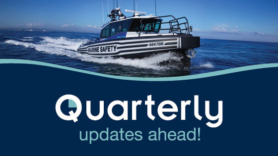 Marine patrol vessel on the water with the words quarterly updates ahead