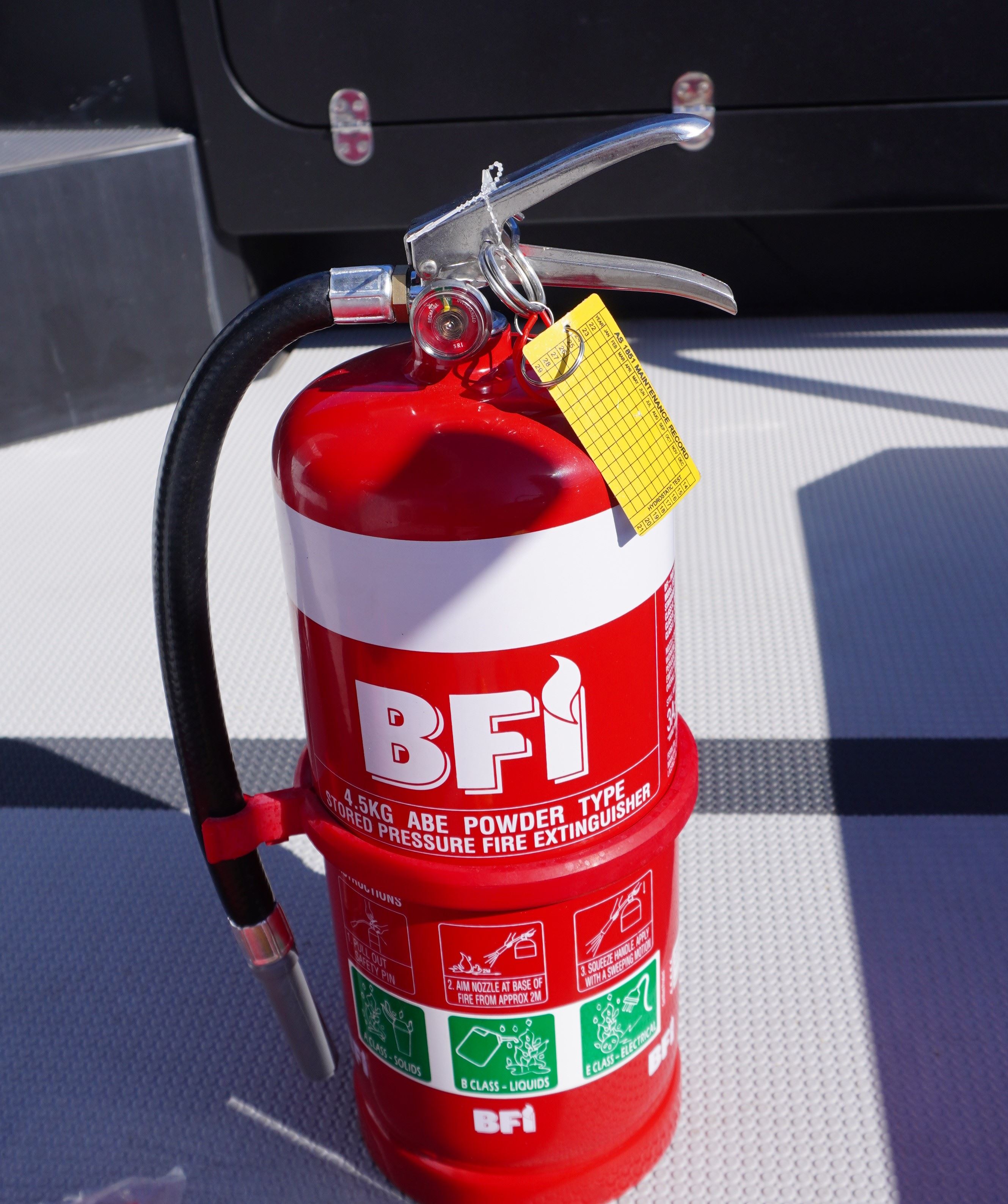 Photo of a fire extinguisher to remind people if their vessel catches fire