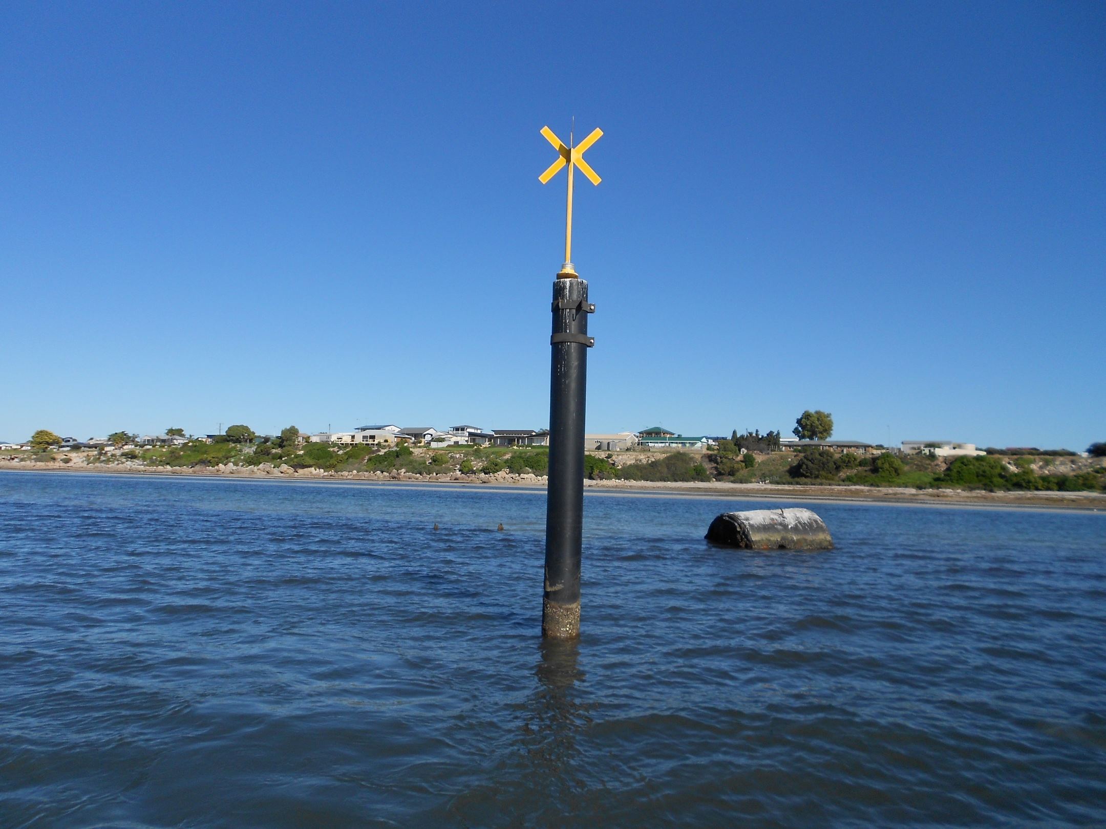 Special mark yellow cross on a pole near the Yulta wreck at Point Turton