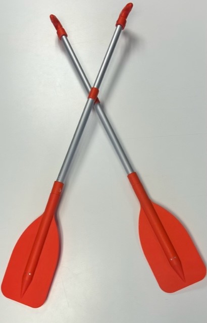 Two paddles with silver handles and orange paddles on them crossed over