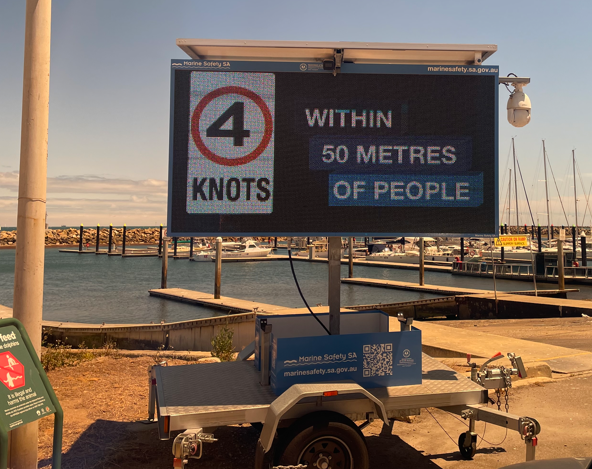 Digital message board showing the message 4 knots within 50 metres of people